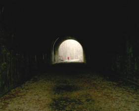 An OES member standing at the end of the tunnel.