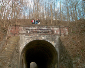 Several OES members climbed to the top of the tunnel for a photo-op.