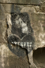 More artistic graffiti on the foundation wall just outside the tunnel.