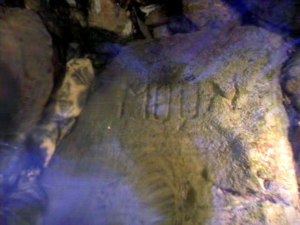 This submitted photo shows a rock in the creek engraved with the word "Moon."