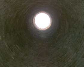 Looking up from inside the round stack.