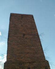The shorter square smoke stack.