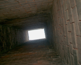 Looking up from inside the square stack.