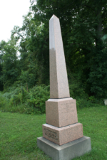 The large granite tombstone of Rev. John Niesz and his wife Mary.