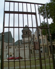 A view of the reformatory from behind bars.