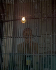 A painting left over from Air Force One in the prison's guard room.