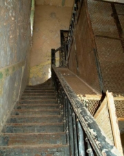 A narrow stairway in the central part of the building.