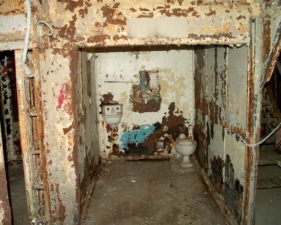 Inside a cell block that had its bars removed.