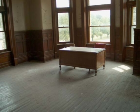 A desk was in one of the offices.