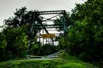 Approaching the Orange Road Bridge from the former roadbed.