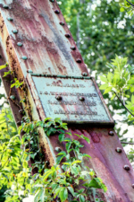 The bridge's east plaque lists the Delaware County officials at the time of its construction.