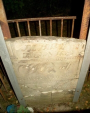Mary's tombstone had been damage, but was repaired and surrounded by a protective barrier.