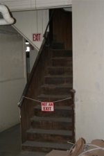 A rear stairway that led to the floors above.