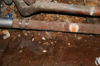 You could see steam rising from a leak in the pipe.