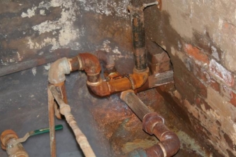 Some of the pipes were leaking, releasing steam.