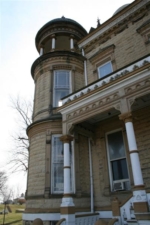 The mansion's turret gave the structure the appearance of a castle.