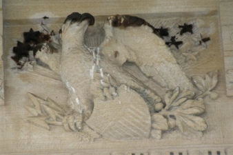 An eagle engraving was above the front door of the castle.