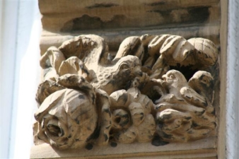 Yet another intricate carving of birds, flowers and a hand.