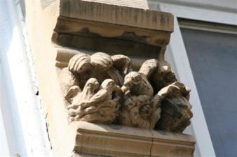 Another detailed carving next to a window.