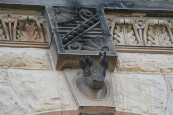 This odd sculpture appeared on the front of the castle above prominent windows.