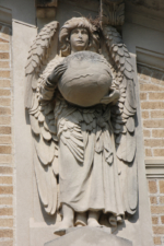 One of the two angels that hold celestial objects. This one was on the south side of the entrance.