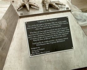 A closer look at the plaque on the Mothman statue.