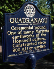 A dedication plaque for Quadranaou Mound.