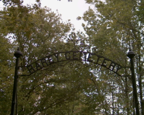 A closer look at the sign above the cemetery gate.