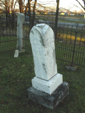 The tombstone for Christina Hacker (1808-1881) and Michael McDonald (1834-1861).