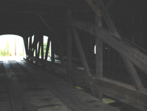 Inside the left side of the bridge.