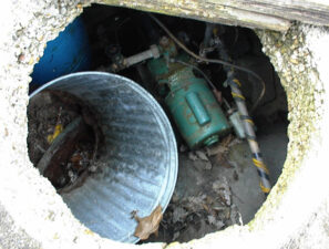 This was either a septic tank or well. It was uncovered and could easily be fallen into if not watching your step.