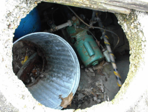 This was either a septic tank or well. It was uncovered and could easily be fallen into if not watching your step.