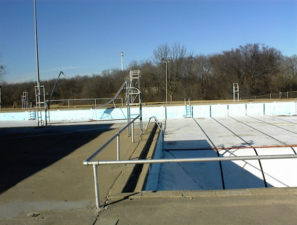 The water slide was on the north side of the pool.
