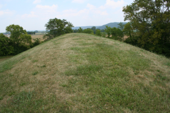 On top of the mound.
