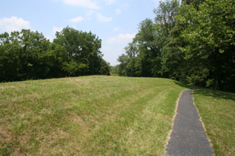 A narrow paved pathway wound around the perimeter of the mound.