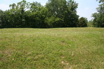 At the end of one of the serpent's curves.