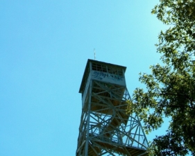 The small cabin at the top of the 100 foot tall tower.