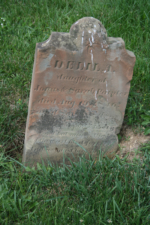 The tombstone of eight-month-old Delila Painter. She died on August 19, 1846.