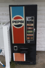 An old Pepsi vending machine sat out front.