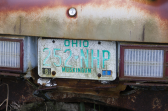 A closer look at the license plate on one of the cars.