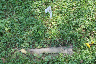 The base of a tombstone that no longer stood.