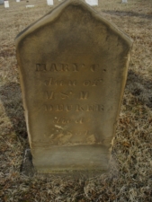 The sandstone tombstone of Mary Decker, who died in 1851.