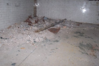 Debris piled up in the corner.