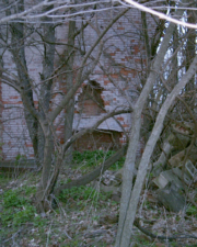 This exterior fireplace was likely used to cook during the summer months.