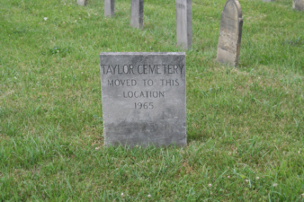 Taylor Cemetery's place marker stated it was moved here in 1965.