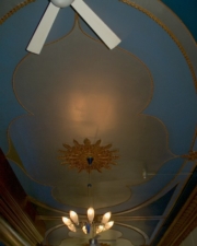 The beautiful work on the ceiling.