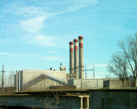 The slightest hint of smoke can be seen coming from the farthest stack.