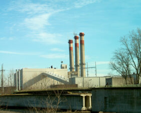 The north stack began to fall as the dynamite was detonated in the middle stack.