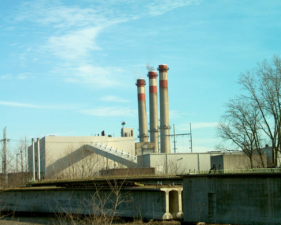 The north stack began to fall as the dynamite was detonated in the middle stack.