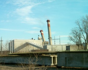 The middle stack fell as the south stack began to lean.